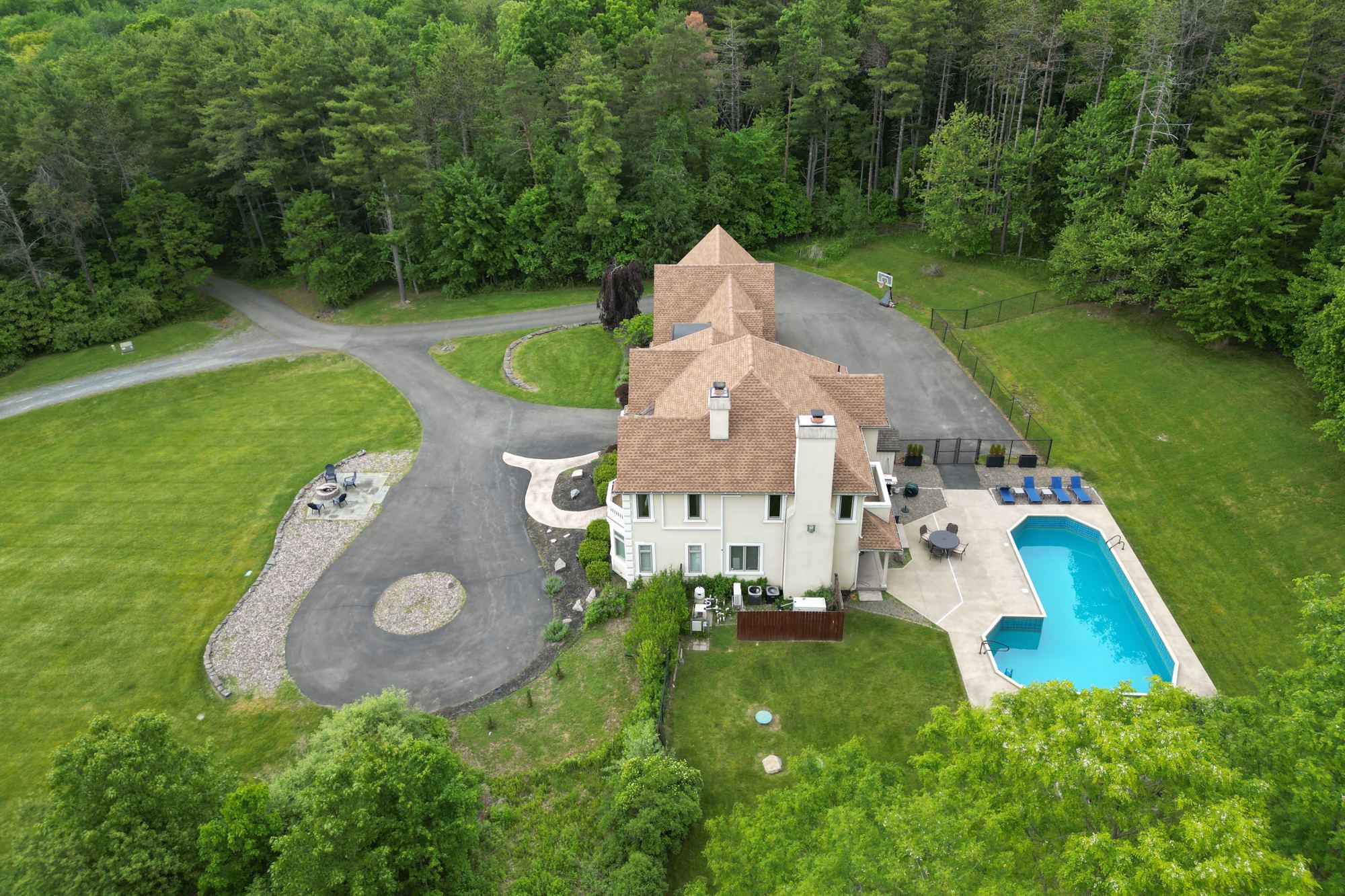 Drone view of the Main House, pool and drive